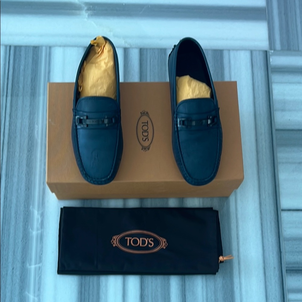 Tod's Blue Loafers with Gold Accent